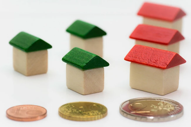 a toy houses and coins