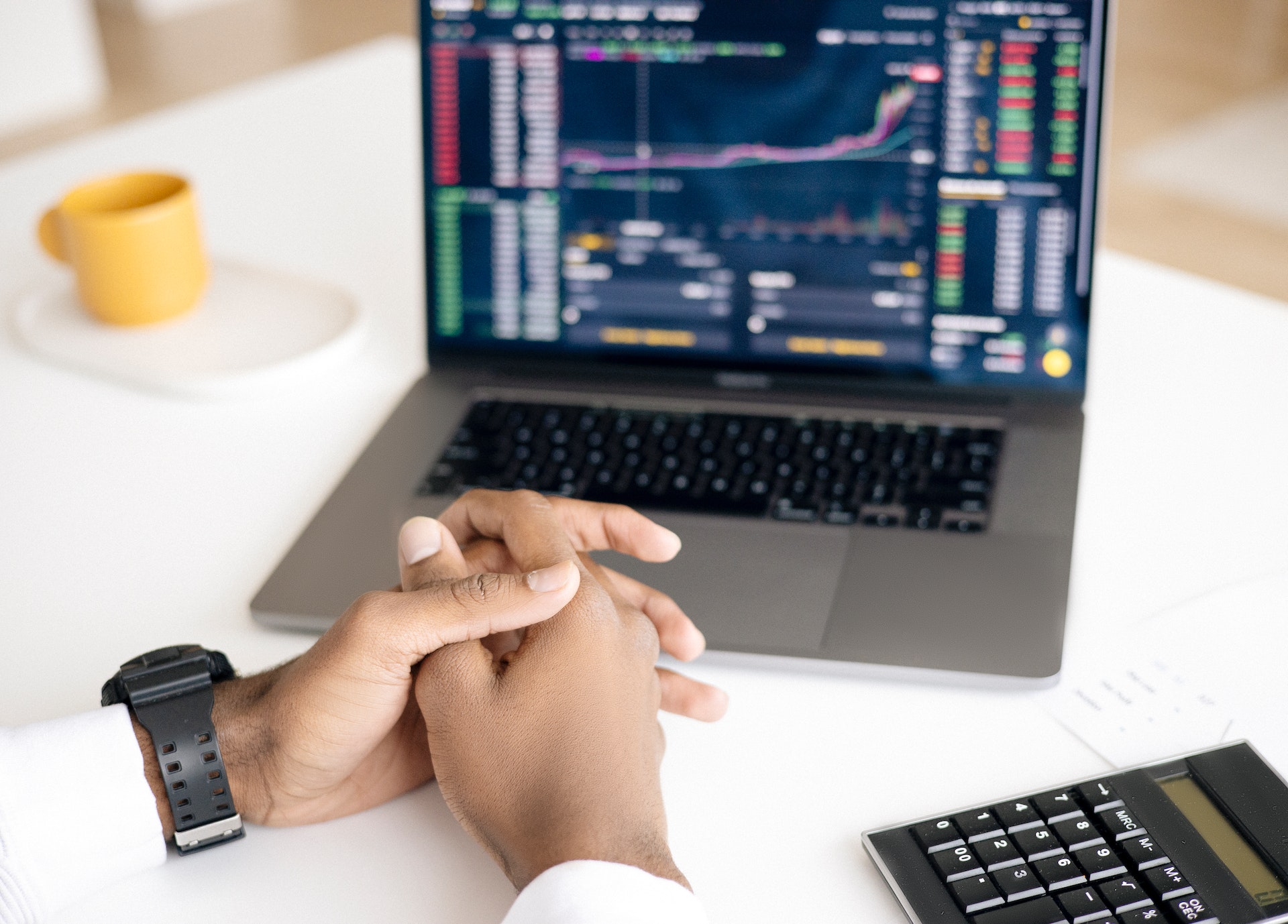 a man is observing the financial markets for index funds